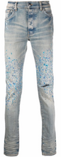 Load image into Gallery viewer, AMIRI paint-splatter detail denim jeans
