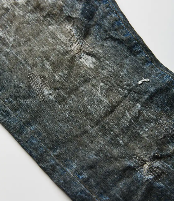 PURPLE distressed skinny-cut jeans