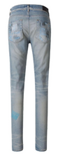 Load image into Gallery viewer, Amiri Distressed Mid-Rise Jeans
